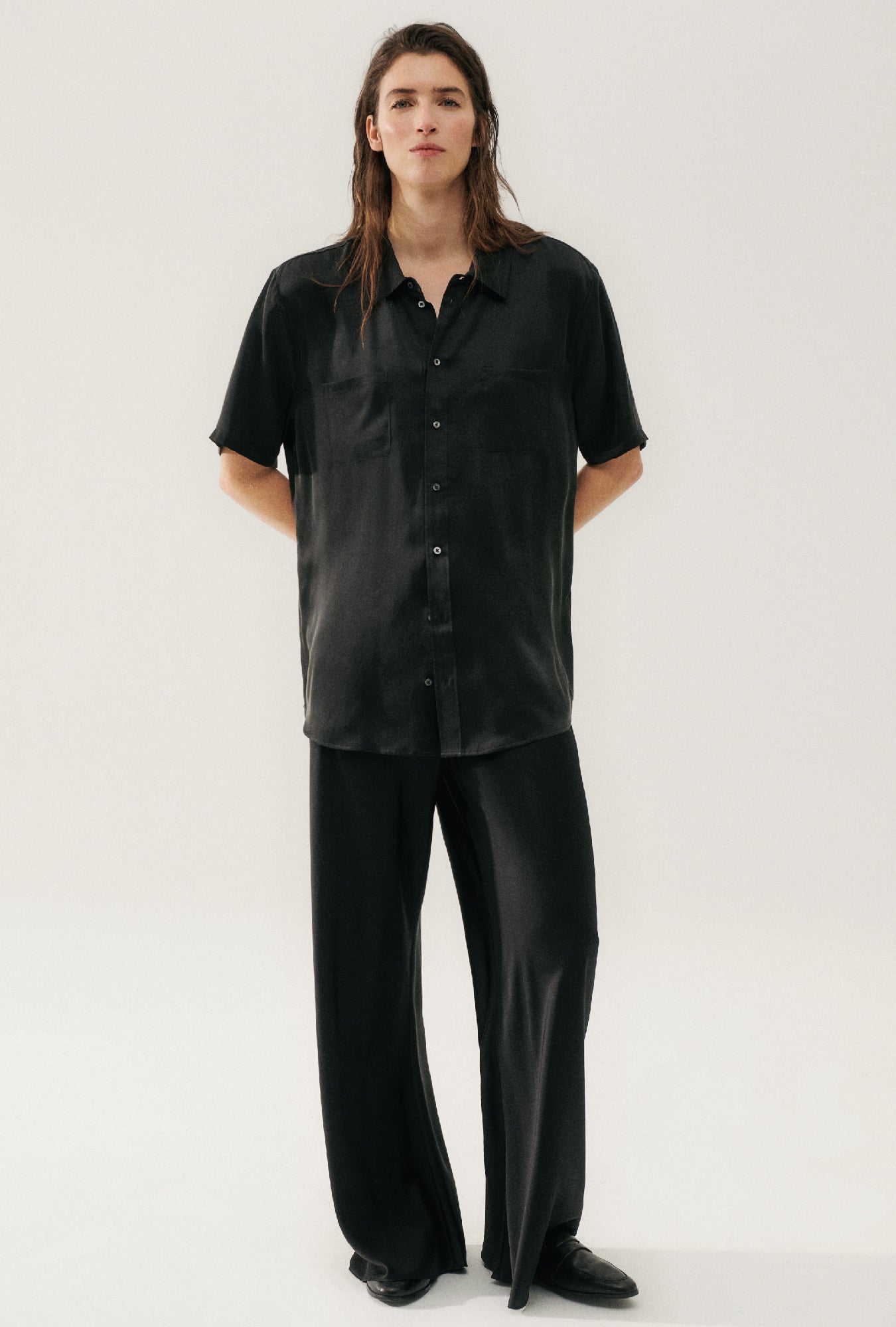 Close view of the glossy 19 momme silk on Silk Laundry's black Bias Cut Pants